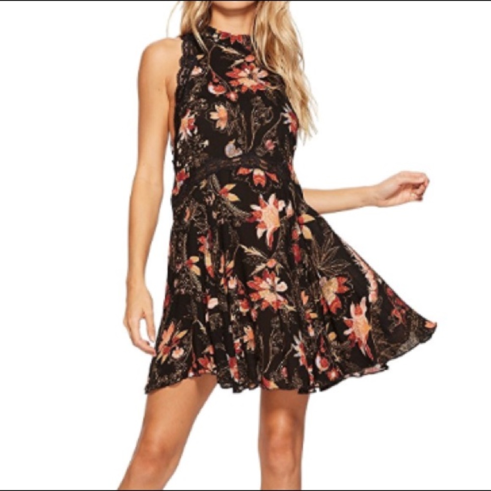 FREE PEOPLE PRINTED “SHE MOVES TUNIC” SZ S